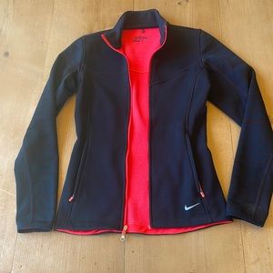 Nike Golf XS women’s Tour Performance Therma-fit zip front jacket.